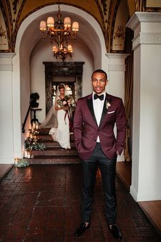 a man in a tuxedo standing next to a bride