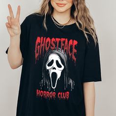 The Halloween shirts are available as Halloween Hoodies Ghost Face Shirt Ideas, Club Tshirt, Top Clothing Brands, Tshirt For Women, Fit For Men, Club Sweatshirts, Top Clothing, Halloween 2024, Black Halloween