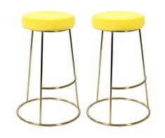 two yellow stools sitting next to each other