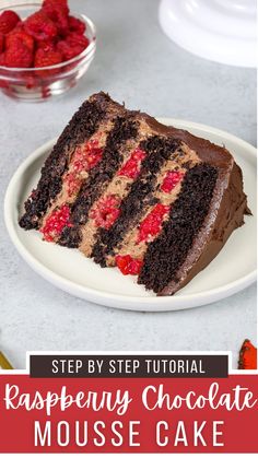 a slice of chocolate raspberry cake on a plate with strawberries in the background