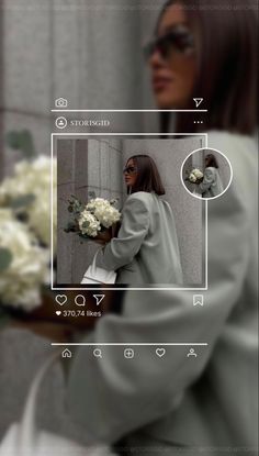 a woman holding flowers in front of a wall with an instagram image on it