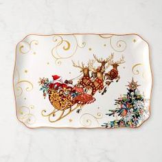 a white plate with santa claus on his sleigh