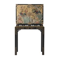 A finely hand-painted and black lacquered cabinet on stand, the cabinet with gold leaf and hand-painted decoration of peacocks in a landscape, with fine Repousse chased brass mounts, on a base with chamfered legs and fretwork spandrels hand-painted in floral and lattice decoration. The LED-lit interior is fitted as a bar with a mirror back and adjustable glass shelf. Theodore Alexander Theodore Alexander Althorp Living History Peacock Bar Cabinet - Bars & Bar Sets in Black Lacquered/Gold/Green | Dry Bars, Theodore Alexander, Hand Painted Decor, Glass Shelf, Mobile Bar, Cabinet Cupboard, Living History, Wine Cabinets, Dining Room Bar