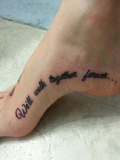 a woman's foot with the words well together forever written on her left side