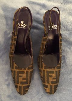 Classic Vintage FENDI Logo Sling back shoes ...  size 9 M  (Equivalent to size US 8 1/2) in great condition!   These shoes are so beautiful and look wonderful on.  They compliment any outfit and you will light up a room with them on :) Made in Italy Designer Brown Slingback Pumps With Pointed Toe, Fendi Heels, Sling Back Shoes, 90s Logos, Back Shoes, Fendi Vintage, Vintage Fendi, Fendi Logo, Island City