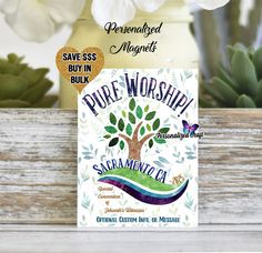 a card with the words pure worship surrounded by flowers and succulents on a wooden table