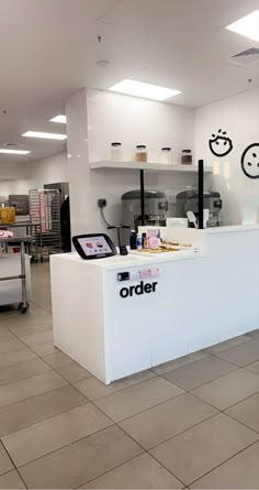 the interior of a store with an order counter