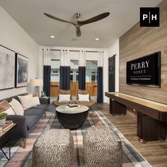 a living room filled with furniture and a flat screen tv mounted on the wall above a fireplace