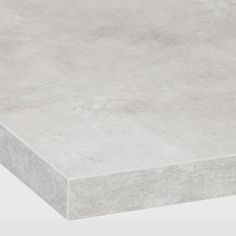 a concrete slab is shown in grey and white colors, with the top section missing