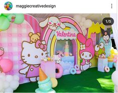 a hello kitty themed birthday party with balloons and decorations on the walls, including an ice cream parlor