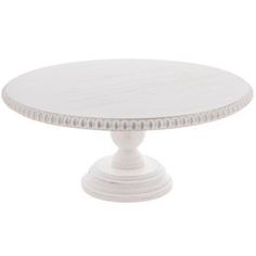 a white cake plate on a white background