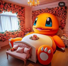 a bedroom decorated in pink and orange with a giant pokemon bed