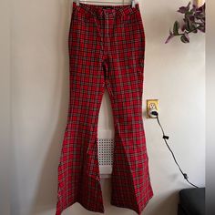 Flared Plaid Pants. Red/Black/White Plaid. Size Medium. Brand New, No Tags. Never Worn. Retro Red Bottoms For Fall, Plaid Stretch Cotton Bottoms, Stretch Plaid Cotton Bottoms, Red Retro Stretch Bottoms, Red Stretch Retro Bottoms, Plaid Flare Pants, Flannel Pants, Red Flannel, Plaid Pants