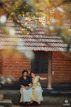 two people sitting on a bench in front of a brick building with the caption save date