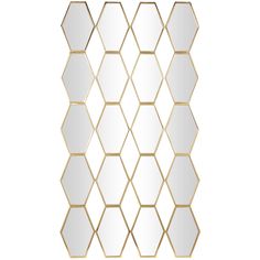 a gold and white wall mirror with hexagonal shapes