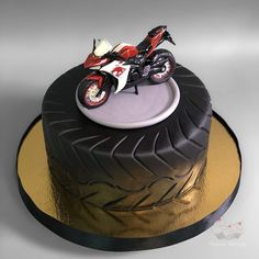 there is a cake with a motorcycle on it