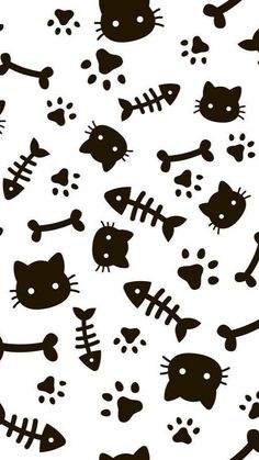 a black and white pattern with cats and bones