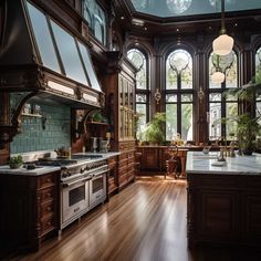 a large kitchen with wooden floors and windows on the wall, along with an island