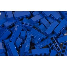 a pile of blue lego blocks sitting next to each other