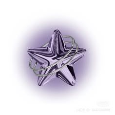 a purple glass star ornament sitting on top of a white surface with silver wire