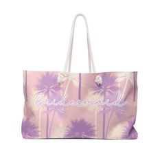 a pink and white bag with palm trees on the side that says bridesmaid