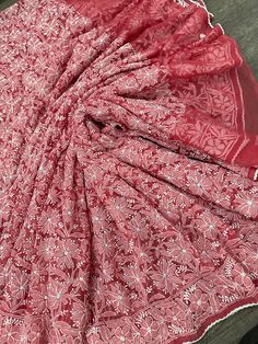 Coral Chikankari georgette saree with all over hand embroidery jaal and crochet lace. Flowy sheer fabric! Fall attached. No Blouse Included Saree width : 42 inches Chikankari Saree, Georgette Saree, Dec 30, Georgette Sarees, Sheer Fabric, Sheer Fabrics, Indian Outfits, Crochet Lace, Wedding Shop