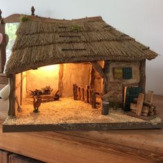 a doll house made to look like a hut