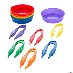 several different colored plastic bowls and spoons on a white background with clippings