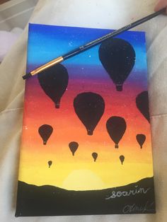 a painting with hot air balloons in the sky at sunset, painted by someone using acrylic paint