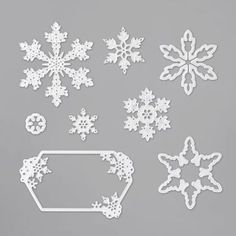 snowflakes and tags are shown on a gray background