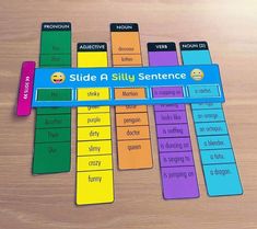 the slide a silly sentence game is displayed on a wooden table with other items around it