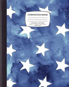 a blue and white book with stars on the cover, in front of a black frame