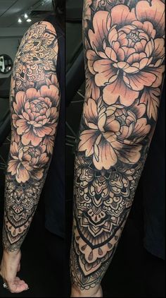 a woman's arm with flowers on it and an ornate design in the middle