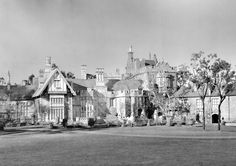 an old black and white photo of a large building