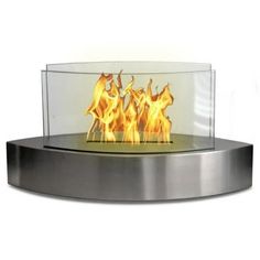 an outdoor fire pit with flames on the sides and metal rims, in front of a white background