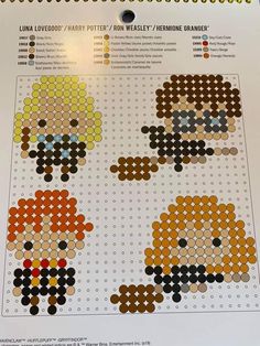 an image of pixel art on the back of a sheet of paper with different colors and sizes