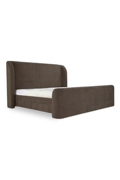 the bed frame is made out of dark brown fabric