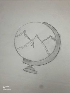 a drawing of mountains in a glass ball