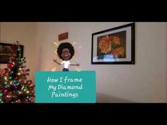 a sign that says how iframe my diamond paintings on it in front of a christmas tree