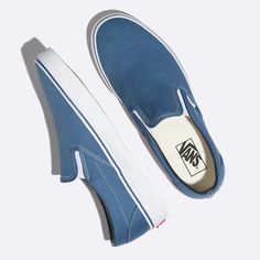 Made with sturdy low profile canvas uppers, the Classic Slip-On is an everyday essential with true “Off The Wall” style. This iconic slip-on shoe also includes supportive padded collars, elastic side accents, and signature rubber waffle outsoles.Details: Mens size listed See size chart for womens sizes Vans style# Vn000eyenvy Blue Slip On Vans, Vans Azul, Estilo Vans, Wall Style, Slip On Vans, Tenis Vans, Blue Vans, Sneakers Vans, Classic Vans