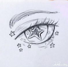 a pencil drawing of an eye with stars around it