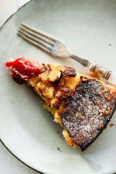 a piece of cake on a plate with a fork