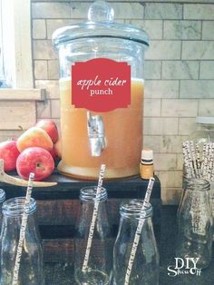 an apple cider punch is sitting on a table