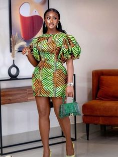 Introducing this beautiful African Green print that speaks perfection. This flawless outfit was made with 100% African wax cotton. The dress is made to order so customisations are welcome.We can add or remove anything you wish.You are welcome to request a fabric change as well.We have a lot of fabric options available.Feel free to start a chat If you have any question. Thank you for visiting our store. Simple Ankara Gowns, Simple Dress Styles, Ankara Dress Designs, Classy Short Dresses, Ankara Short, Ankara Short Gown Styles, African Outfits, African Print Dress Ankara, Short African Dresses