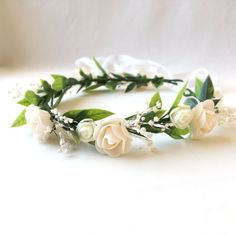 White flower crown, White rose Flower crown, Buttercup headpiece, Wedding crown, White flower bridal crown, Flower crown for bride → This flower crown made of white flowers and green leaves has a flexible wreath design with preserved and artificial flowers. It is combined with a long soft ribbon at the back to fit any size. The elegant pretty flower crown is handmade and is a great alternative to create a bohemian look at your wedding. Compatible with real dried baby's breath flowers. It is a be Flower Girl Headpiece Floral Crowns, White Rose Flower Crown, Artificial Flower Crown, Green Flower Crown, Flower Crown White, Crown For Bride, Book Backdrop, White Flower Crown, Flower Crown Bride