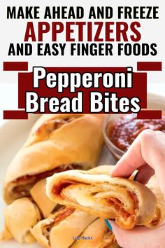 a person holding a piece of pizza in their hand with the words make ahead and freeze appetizers and easy finger foods pepperoni bread bites