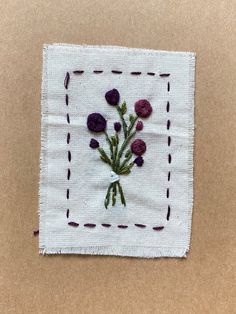 a piece of cloth with flowers on it