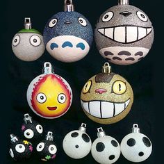 there are many different ornaments with faces on them