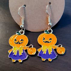 These Cute Pumpkin Dolls Are Ready To Trick Or Treat With You! Halloween Orange, Pumpkin Earrings, Halloween Jewelry, Cute Pumpkin, Halloween Women, Orange And Purple, Color Orange, Trick Or Treat, Jewelry Earrings