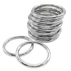 a stack of metal rings on a white background